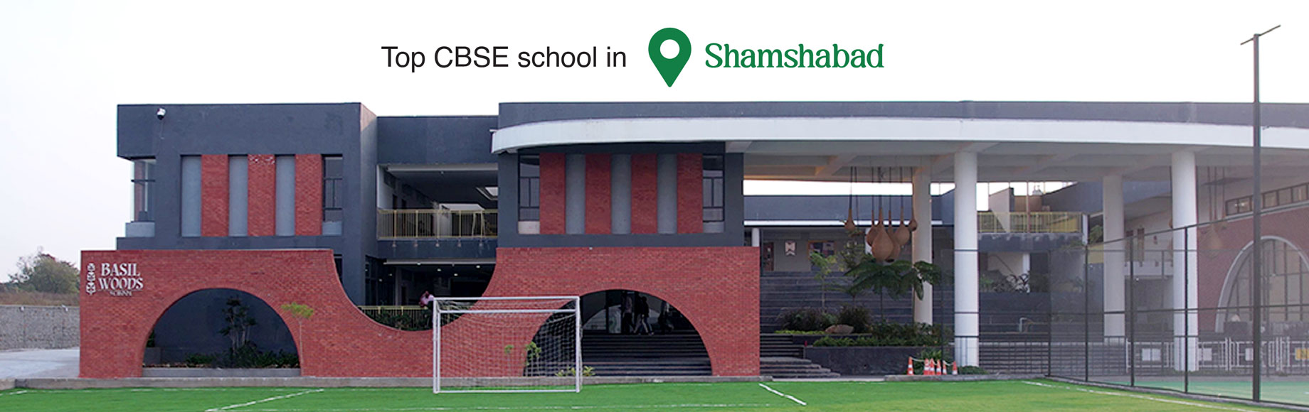 A desk lamp designed by Edouard Wilfrid Buquet in 1925. It features a double-arm design and is made from nickel-plated brass, aluminium and varnished wood.